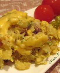 Жареный картофель с яйцом и сыром