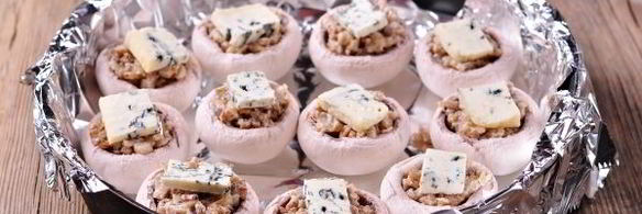 шампиньоны, фаршированные ветчиной и сыром, в духовке