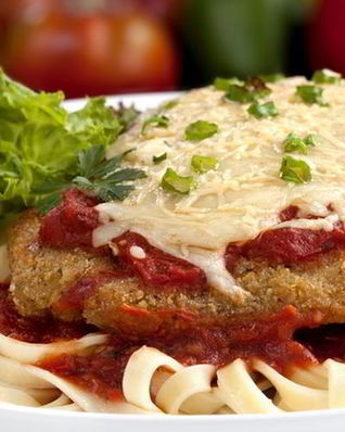 Телятина под соусом и сыром