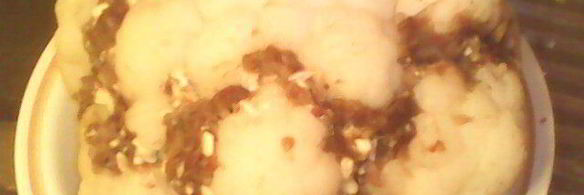 фаршированная цветная капуста, запеченная под брынзой