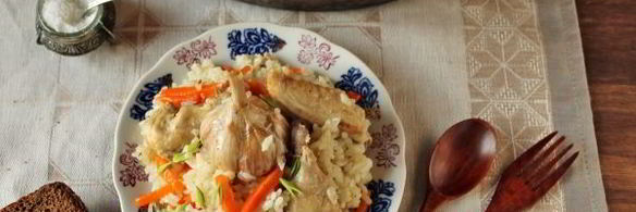 плов с курицей в утятнице на плите