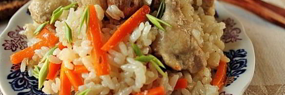 плов с курицей в утятнице на плите