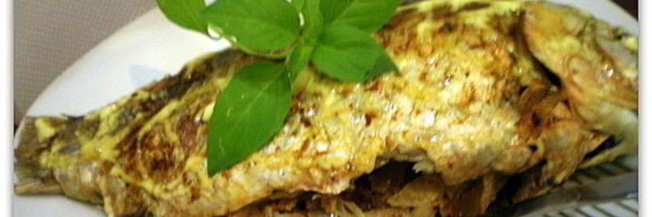 Карась, фаршированный квашенной капустой