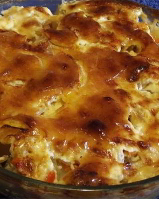 Рыба, запеченная под овощами