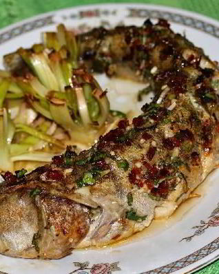 Судак, запеченый на итальянский манер