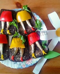 Бутерброды со шпротами праздничные